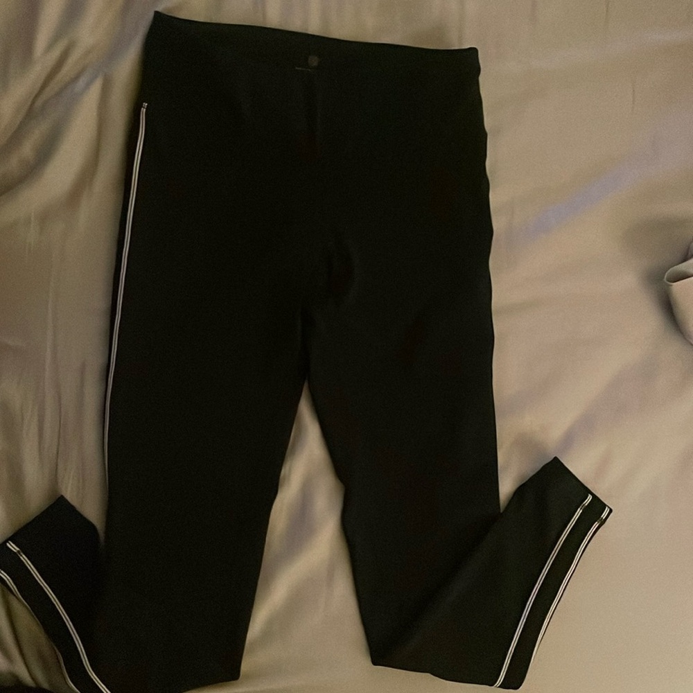 Tangerine brand black leggings with white stripes down the side Size S